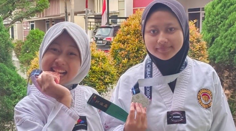 Jelang HUT ke-77 NKRI, Areta dan Aisyah Ukir Prestasi di Kejurcab Taekwondo