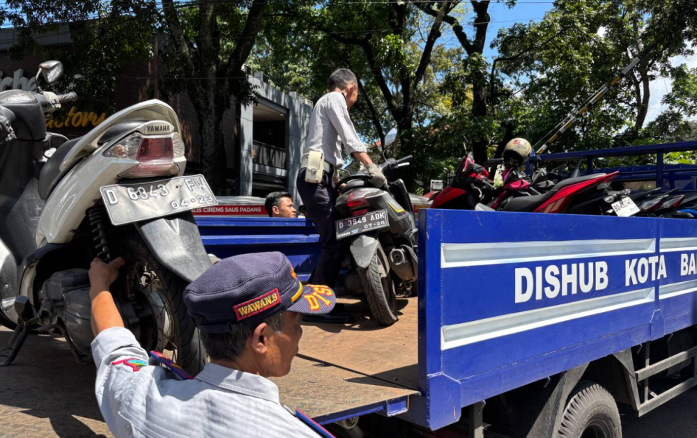 Parkir Liar dan Kota Wisata yang Kehilangan Wajah