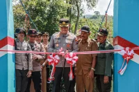 Kapolres Jember Resmikan Jembatan Merah Putih, Akses Tempurejo-Silo Kini Lebih Aman