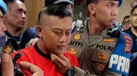 Taufik Hidayat Jalani Rekonstruksi Kasus Penganiayaan di Polda Jabar