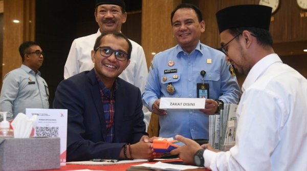 Kemenkumham Salurkan Zakat 1,4 Miliar melalui Baznas