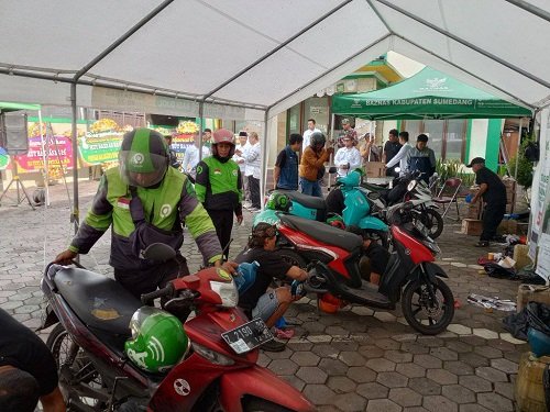 Memperingati HUT ke-24, BAZNas Gelar Ganti Oli Gratis untuk Pengemudi Ojol